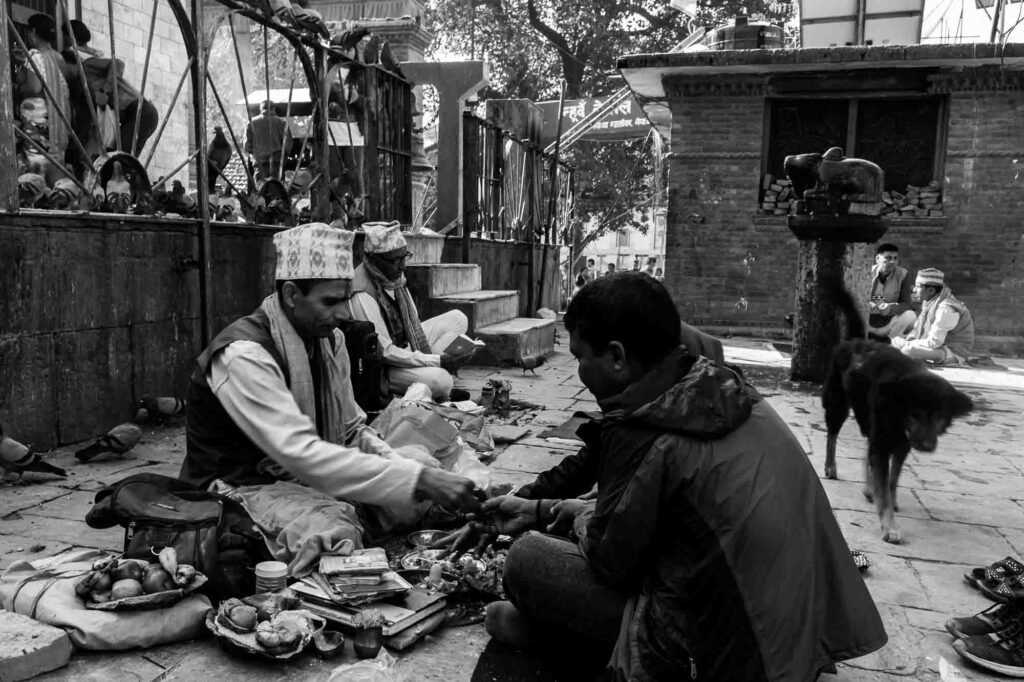Brahmins gurus in the side of temple.