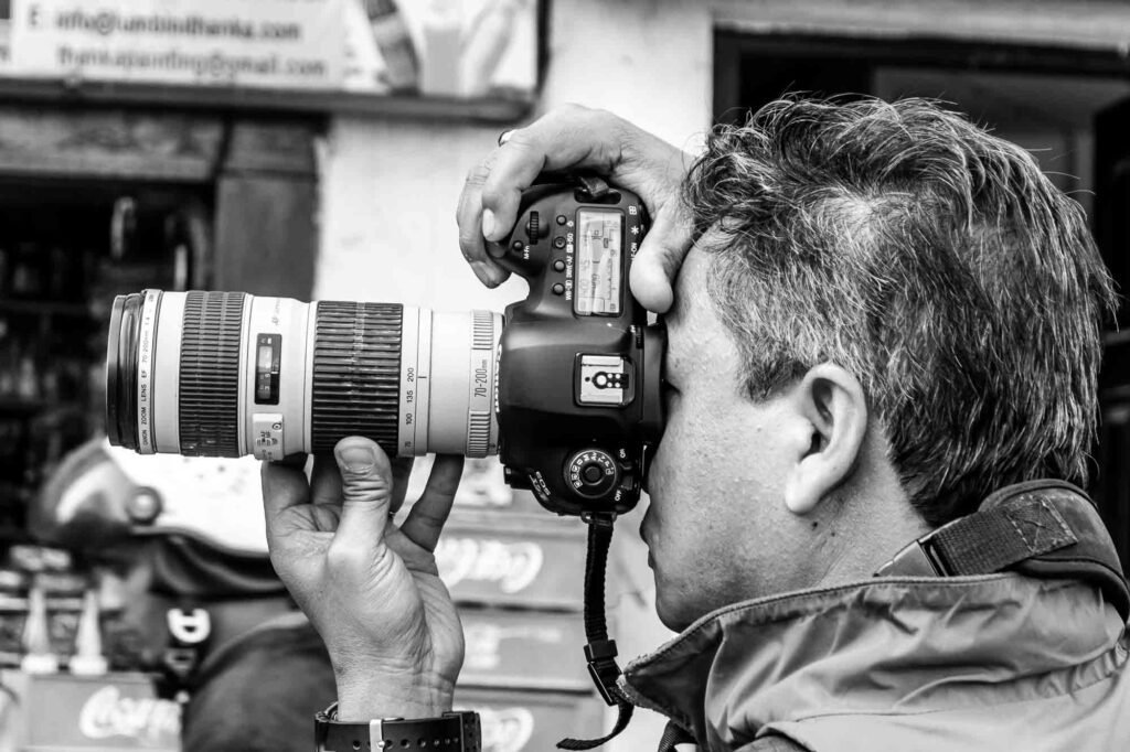 Photographer in the street.