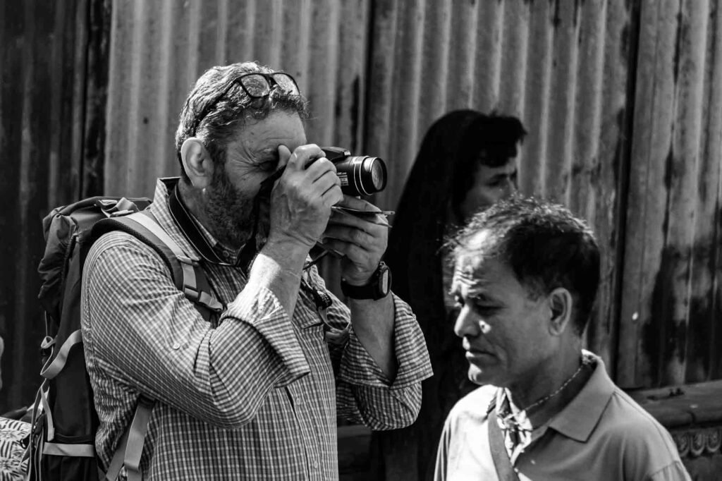 Foreigner taking photographs.