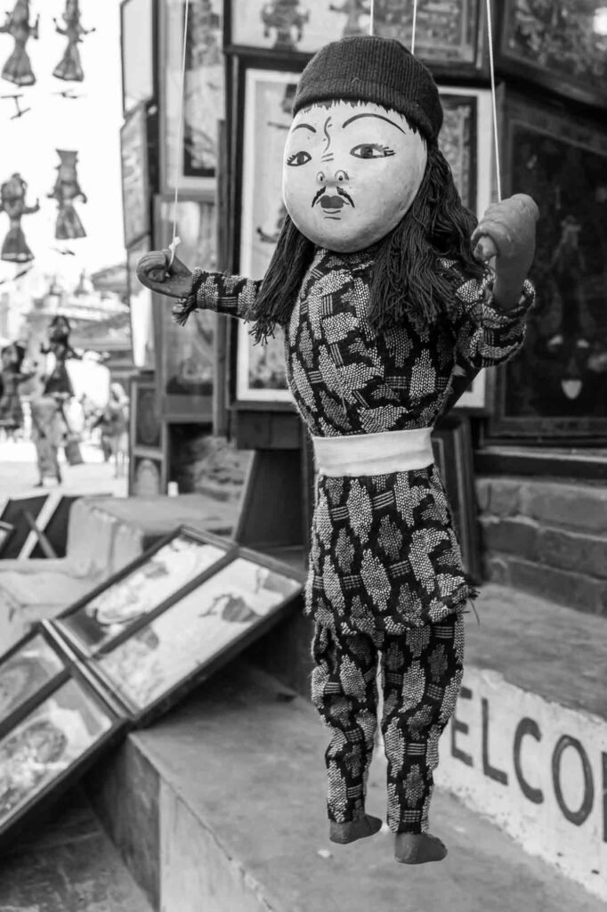 Hanging doll in the shop.