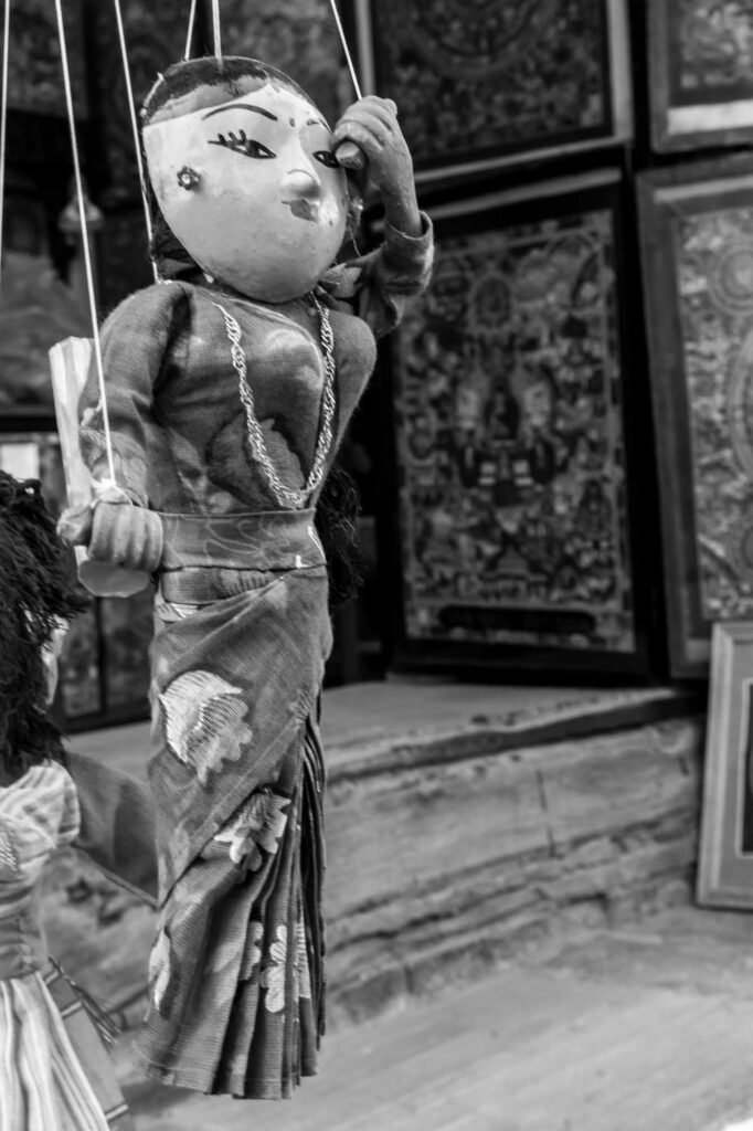 Hanging doll in the shop.