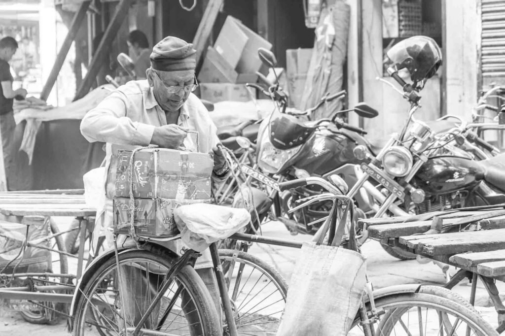 Tiding goods in bicycle.