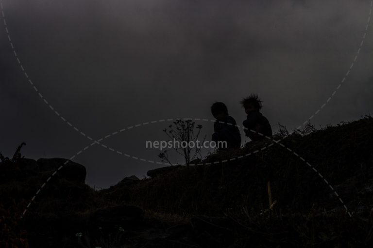Children Waiting at Dusk
