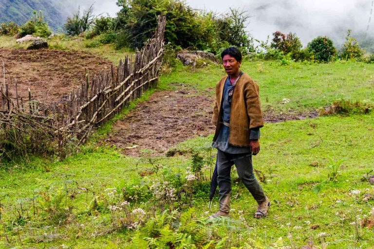 Farmer Walking the Ridge