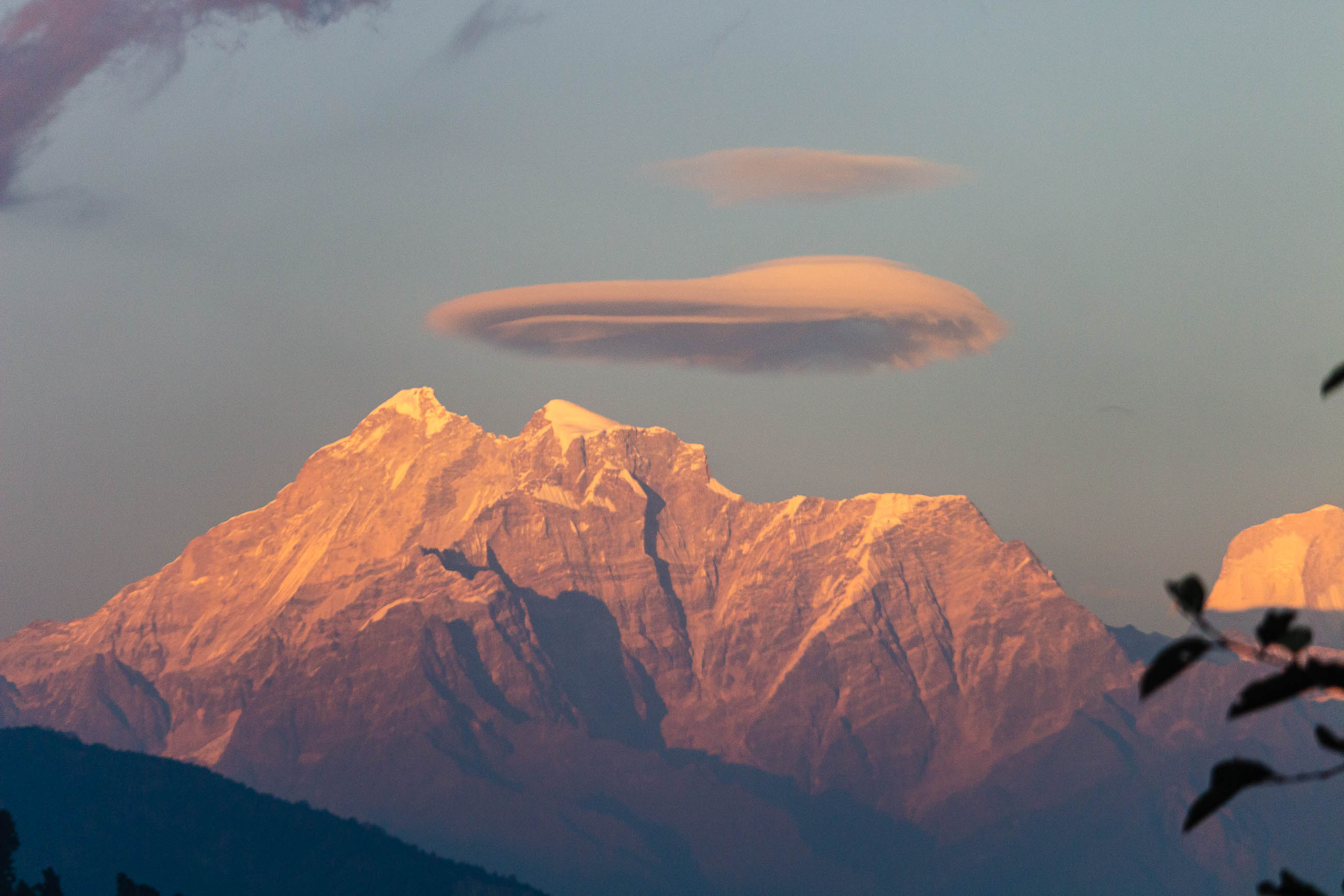 Lenticular Clouds Hovering Over Gauri Sankar Peak at Sunset.